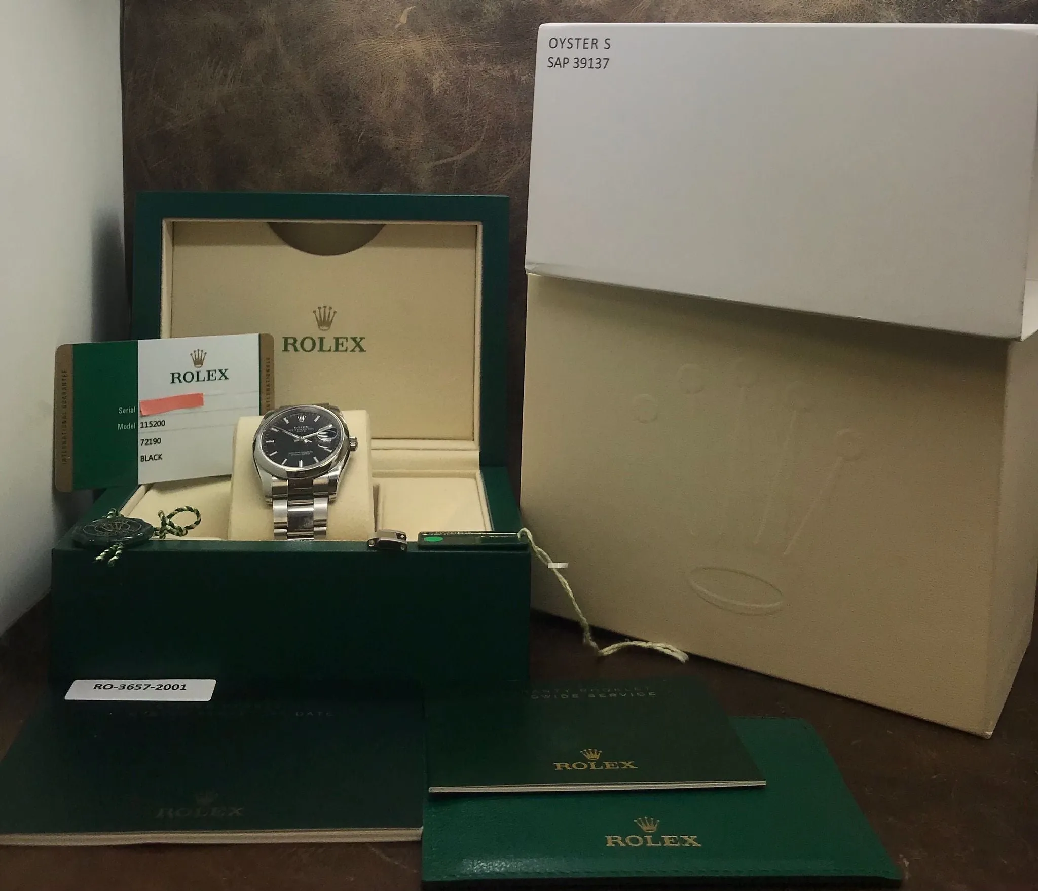 Rolex Date 34mm B&P 115200 Black Dial Automatic Watch