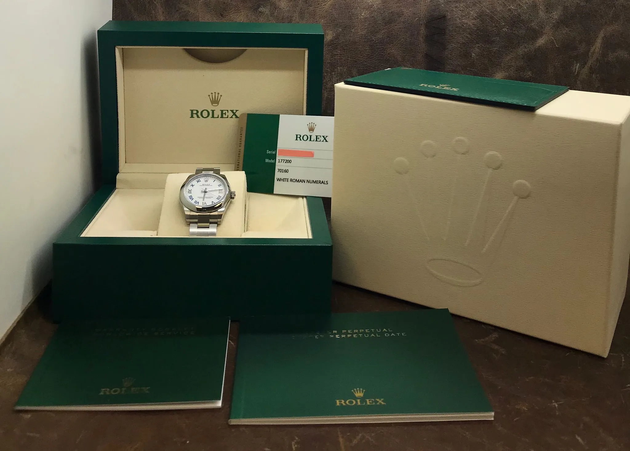 Rolex Oyster Perpetual 31mm Midsize 177200 White with Blue & Silver Roman  Dial Automatic Women's Watch